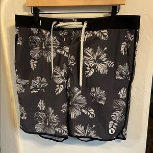 Vuori Black and White Floral Mens swim Shorts